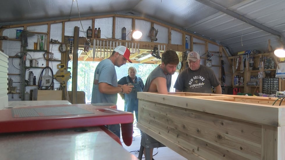Friends of Cayce Seal gathered to build a coffin for their friend.