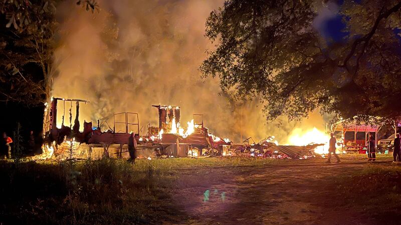 The home on T Webber Drive was already engulfed in flames when the firefighters arrived at the...