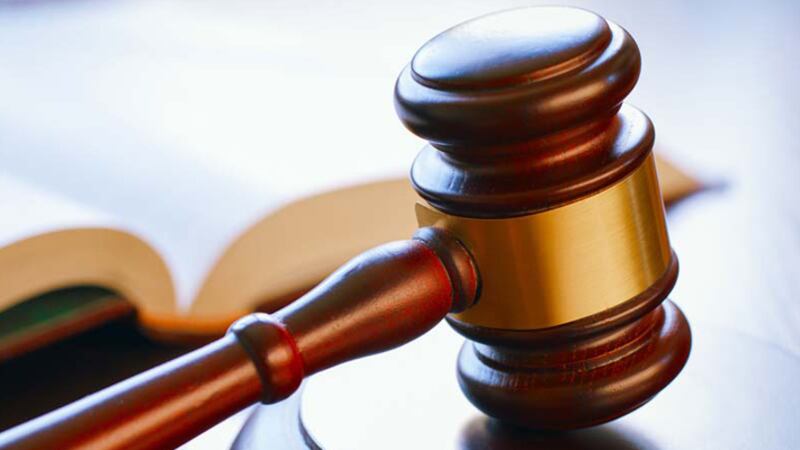 Gavel on wooden block