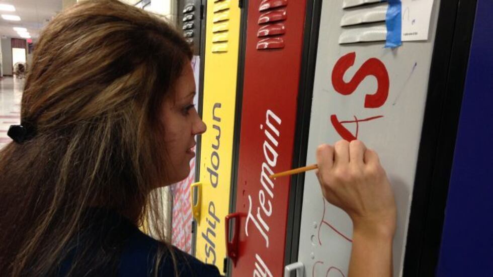 Teachers and other volunteers have turned one hallway at the school into an "Avenue of...