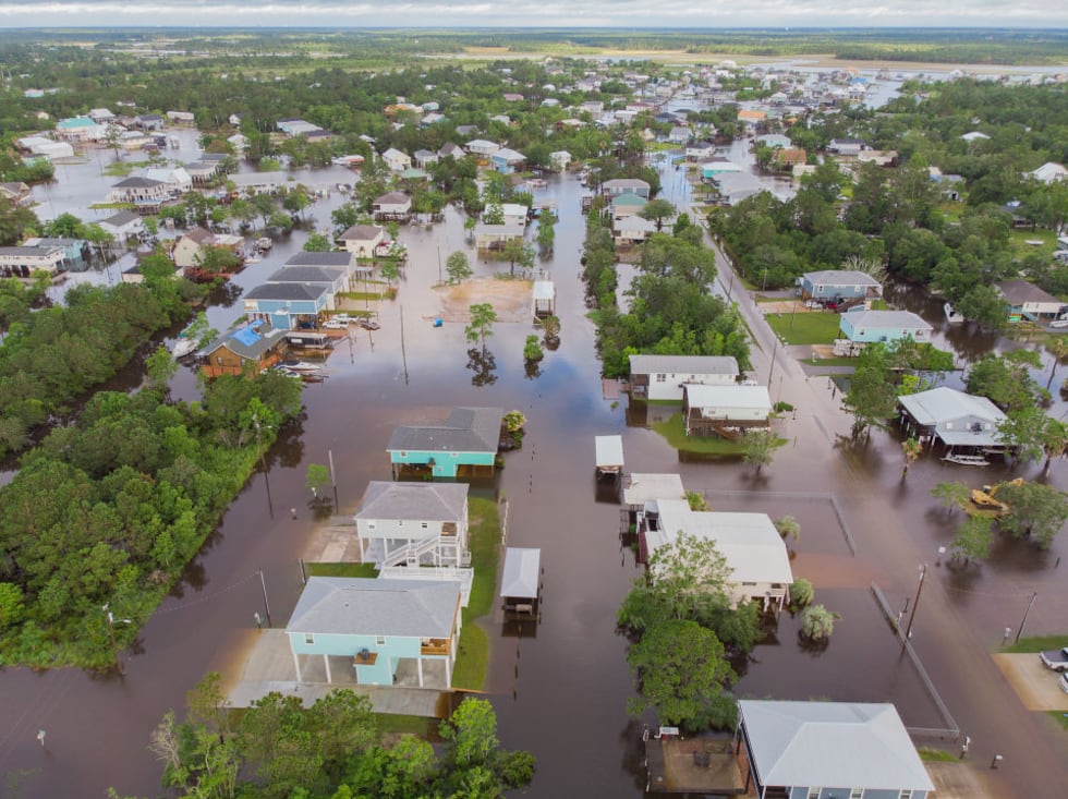 Tropical Storm Claudette floods Bay St. Louis. An areal image near Central Avenue and Highway...