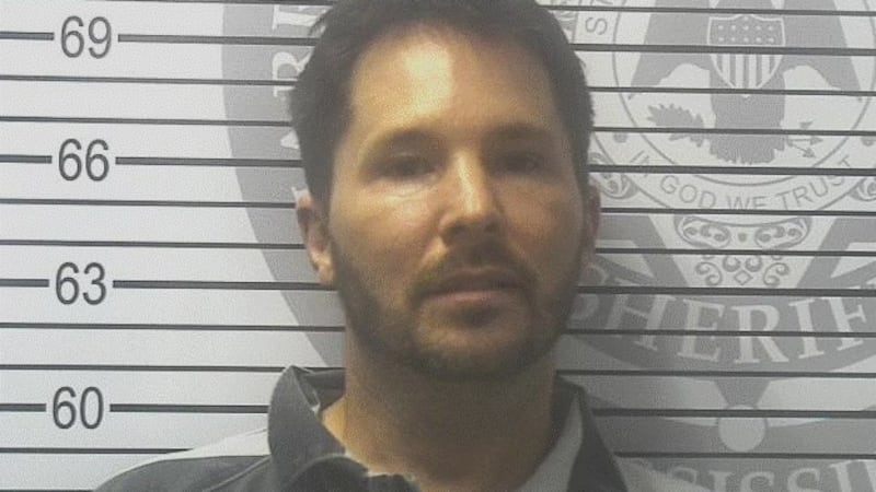 Biloxi Councilman Robert Deming was taken into custody by Harrison County sheriff’s deputies...
