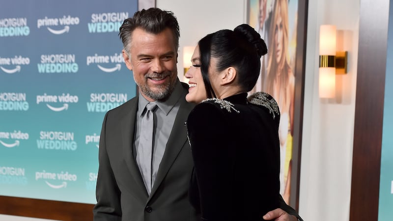 FILE - Josh Duhamel, left, and Audra Mari arrive at the premiere of "Shotgun Wedding,"...